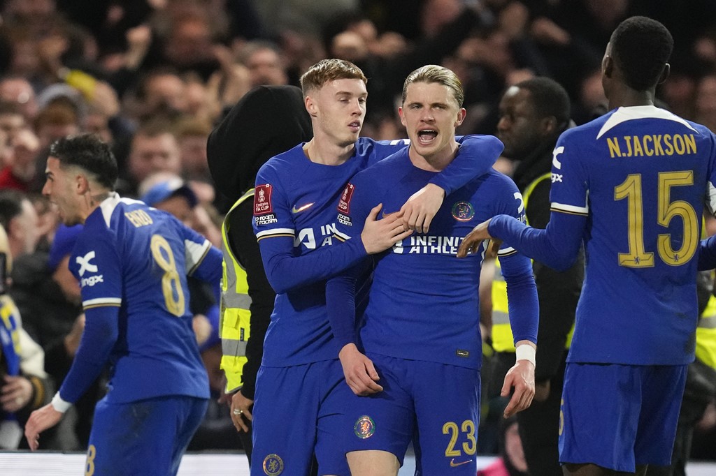 Chelsea Players celebrating after scoring a goal